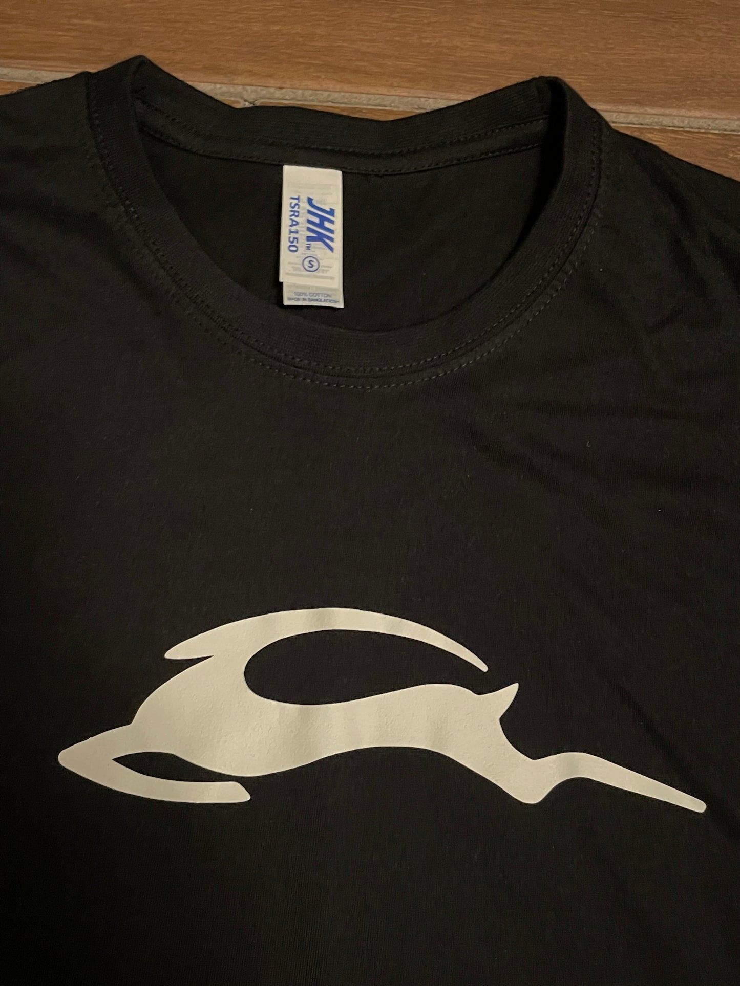 Glow in the dark leaping deer logo tee